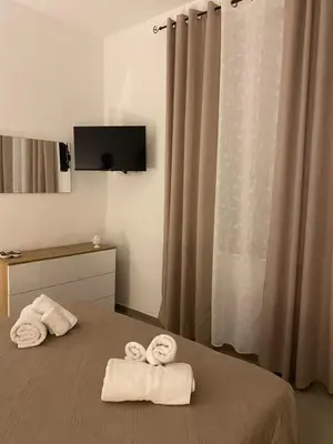 Letto o letti in una camera di Il Cortiletto Casa Vacanze