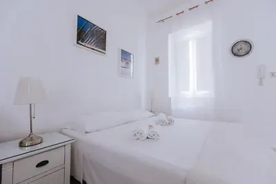 Letto o letti in una camera di Andreja Maniace
