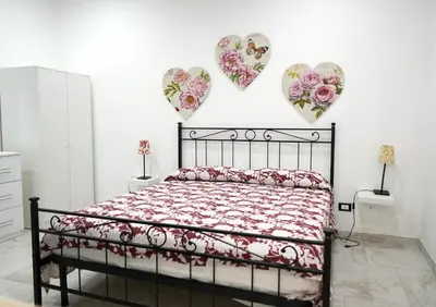 Letto o letti in una camera di Blu Artale