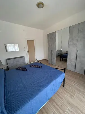 Letto o letti in una camera di Casa Salerno