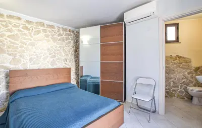 Letto o letti in una camera di 5 Bedroom Gorgeous Home In Brucoli