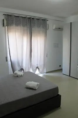 Letto o letti in una camera di La dimora di Damone & Finzia