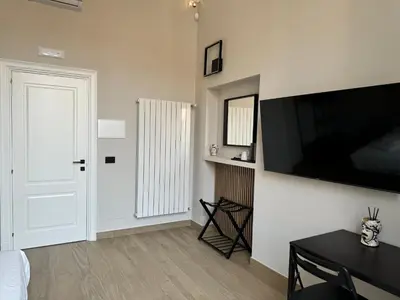 TV o dispositivi per l'intrattenimento presso Siculus Bed and Breakfast