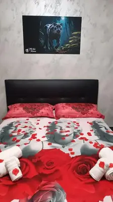 Letto o letti in una camera di Marilyn Rooms - Suite Catania center