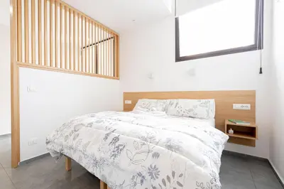 Letto o letti in una camera di Eos - Elegant Apartments & Suites