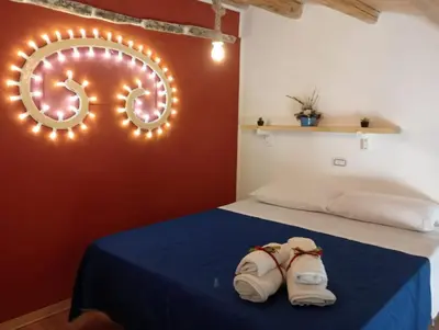 Letto o letti in una camera di Vicolo San Paolo