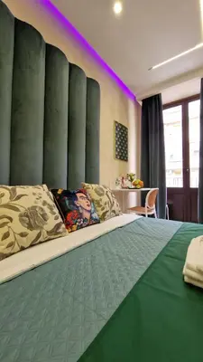 Letto o letti in una camera di Superior Suite & Apartment Catania