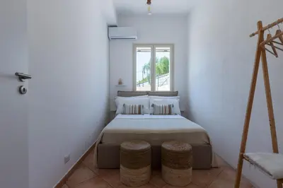 Letto o letti in una camera di Fontane Bianche Villas