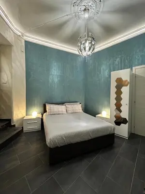 Letto o letti in una camera di Domus Cestai