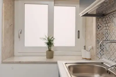 Cucina o angolo cottura di House Island Ortigia