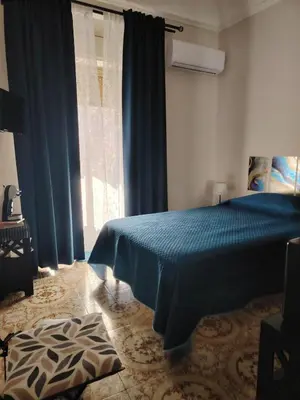Letto o letti in una camera di Carmen House
