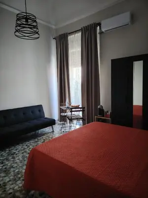 Letto o letti in una camera di Carmen House