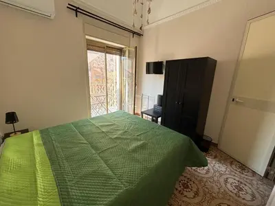 Letto o letti in una camera di Carmen House