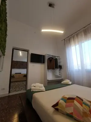 Letto o letti in una camera di Tiritù Apartments