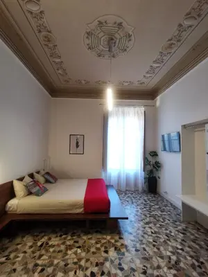 Letto o letti in una camera di Tiritù Apartments
