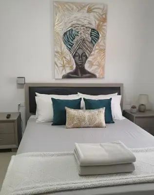 Letto o letti in una camera di Giumahome