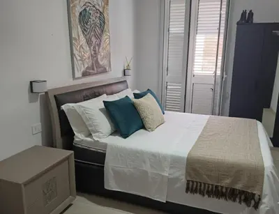 Letto o letti in una camera di Giumahome