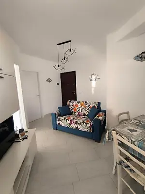 TV o dispositivi per l'intrattenimento presso Appartamento d' amare vicino il mare