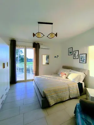 Letto o letti in una camera di Appartamento d' amare vicino il mare