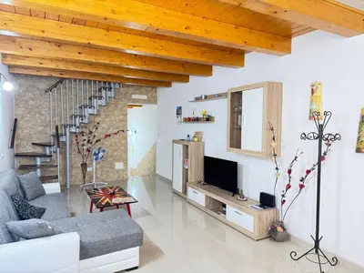 Area soggiorno di Be Sea Sicily Stays