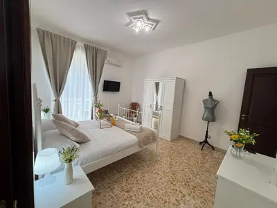TV o dispositivi per l'intrattenimento presso AMURI HOUSE- Intero appartamento vicino al MARE e ORTIGIA