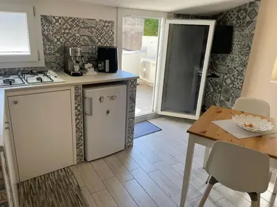 Cucina o angolo cottura di Piccolo appartamento
