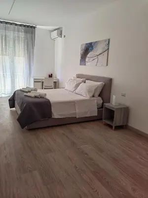 Letto o letti in una camera di Stupor Mundi Catania