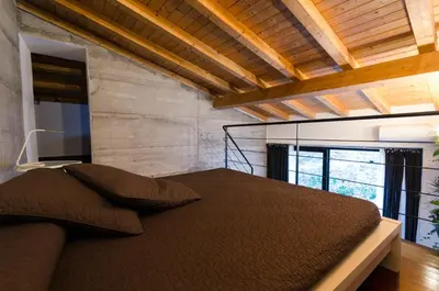 Letto o letti in una camera di Pietranera Apartments