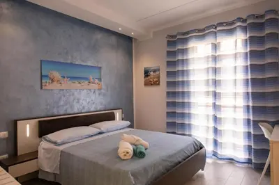 Letto o letti in una camera di Pietre Azzurre Rooms