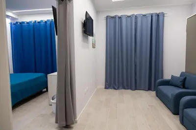 Area soggiorno di Pietre Azzurre Rooms