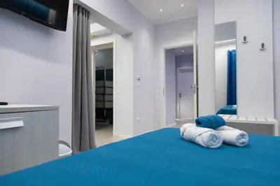 Letto o letti in una camera di Pietre Azzurre Rooms