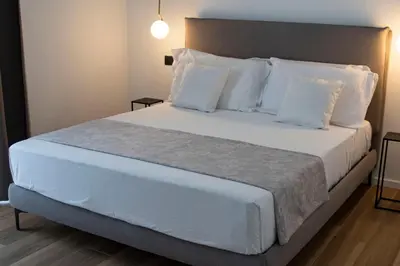 Letto o letti in una camera di Mamalà