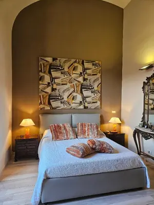 Letto o letti in una camera di Cutelli House Central 100mq