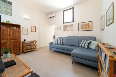 Area soggiorno di GuestHost - Pam's Seaview Apartment