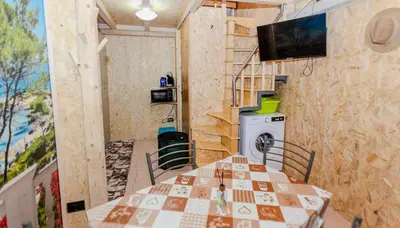 TV o dispositivi per l'intrattenimento presso Mini casa a 30 mt dalla spiaggia