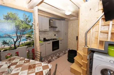 Cucina o angolo cottura di Mini casa a 30 mt dalla spiaggia