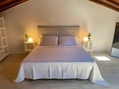 Letto o letti in una camera di Sotto il Fortino, Casa Vacanze