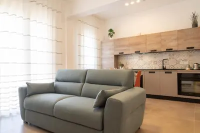 Cucina o angolo cottura di GuestHost - Dimora dei Consoli Apartments