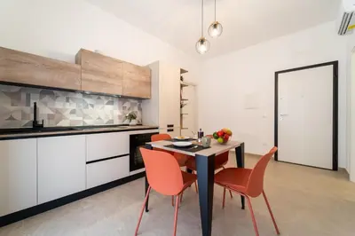 Cucina o angolo cottura di GuestHost - Dimora dei Consoli Apartments