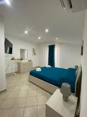 Letto o letti in una camera di La Casa di Noah