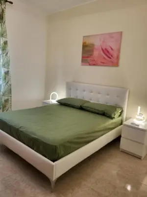 Letto o letti in una camera di Victor' apartment