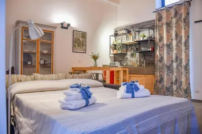 Letto o letti in una camera di Dimora Maura