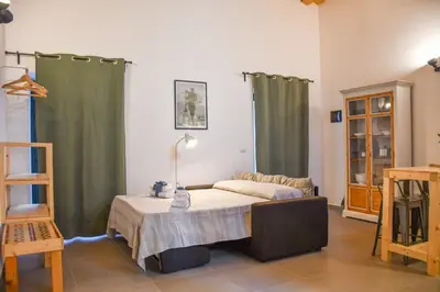 Letto o letti in una camera di Dimora Maura