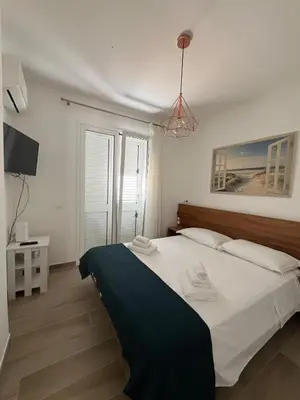 Letto o letti in una camera di Trinacria Bedda Spinazza con Piscina