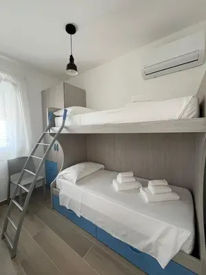 Letto o letti in una camera di Trinacria Bedda Spinazza con Piscina