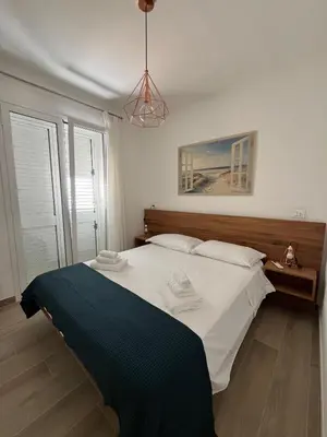 Letto o letti in una camera di Trinacria Bedda Spinazza con Piscina
