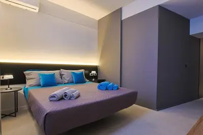 Letto o letti in una camera di DreamSuite a 300m da Ortigia