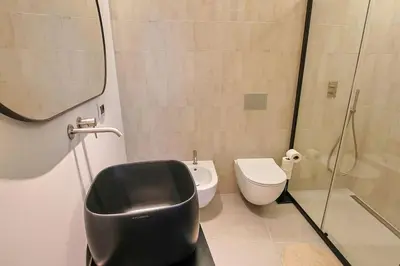 Bagno di DreamSuite a 300m da Ortigia