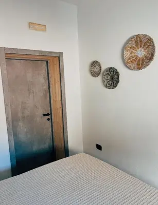 Letto o letti in una camera di JJBayt