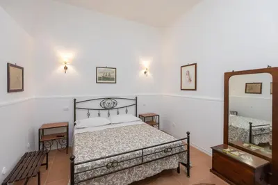Letto o letti in una camera di Casa Ariadne by Ortigia Apartments